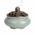 Lotus-Räuchergefäß aus Keramik in Grün und Bronze